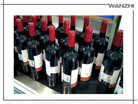 全自動(dòng)紅酒定位貼標機_ 紅酒自動貼標機_東莞市亚洲第一免费播放区自動化科技有限公司